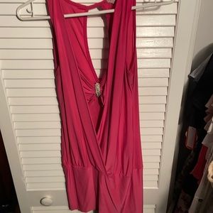 Pink sleeveless shirt. Can wear as a mini dress.